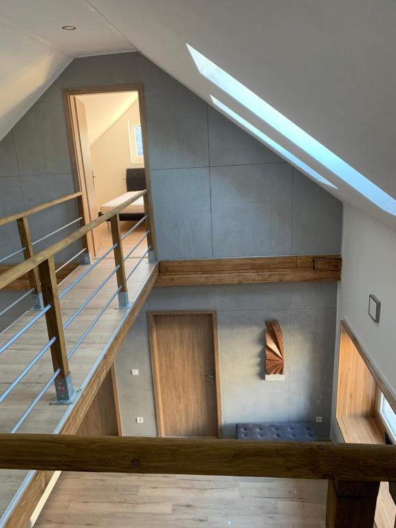Posteľ alebo postele v izbe v ubytovaní Loft Pihenő és Wellness Ház