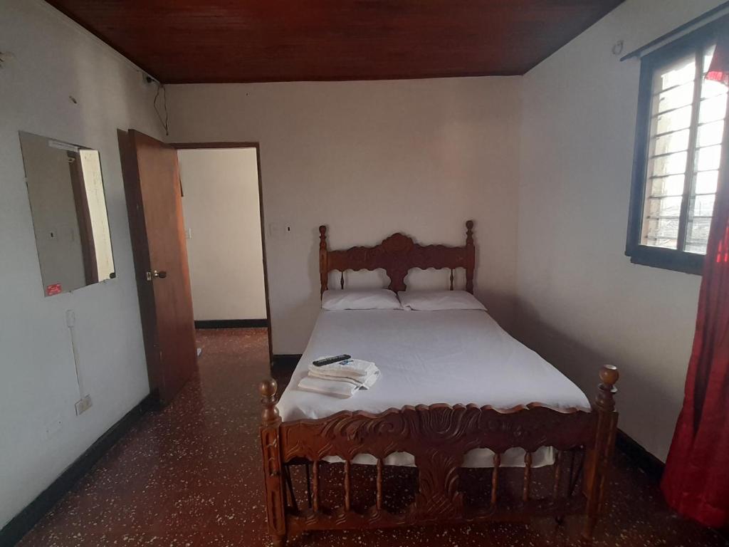 Postel nebo postele na pokoji v ubytování HOTEL en MONTERIA CITY