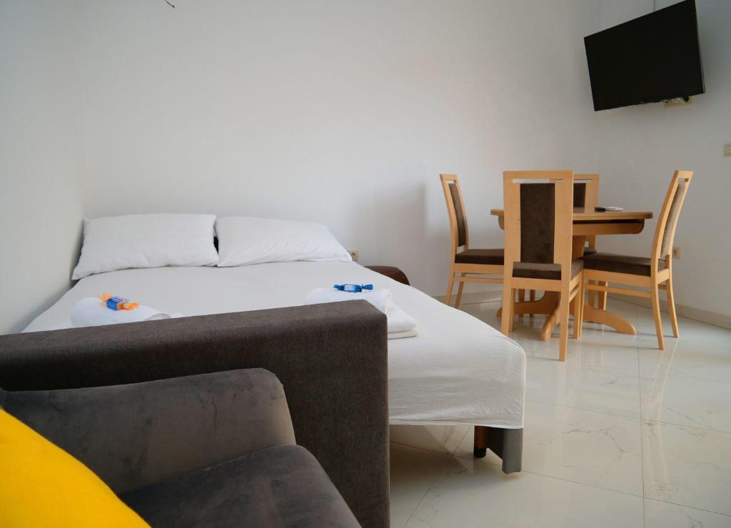 Posedenie v ubytovaní Apartments Verdina