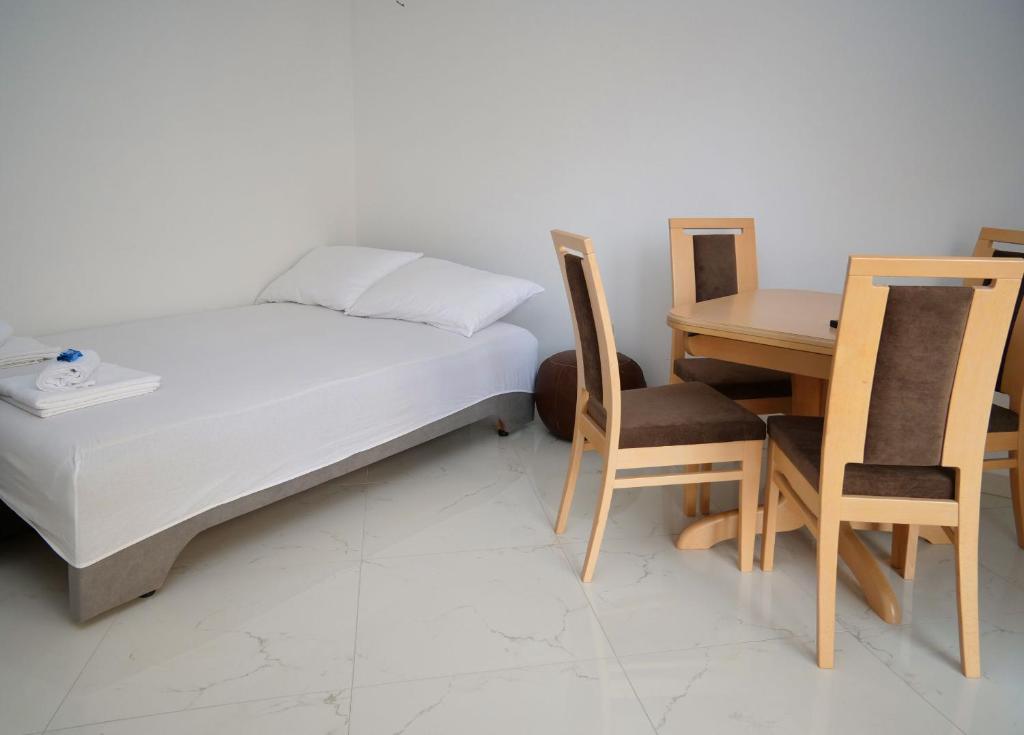 Posteľ alebo postele v izbe v ubytovaní Apartments Verdina