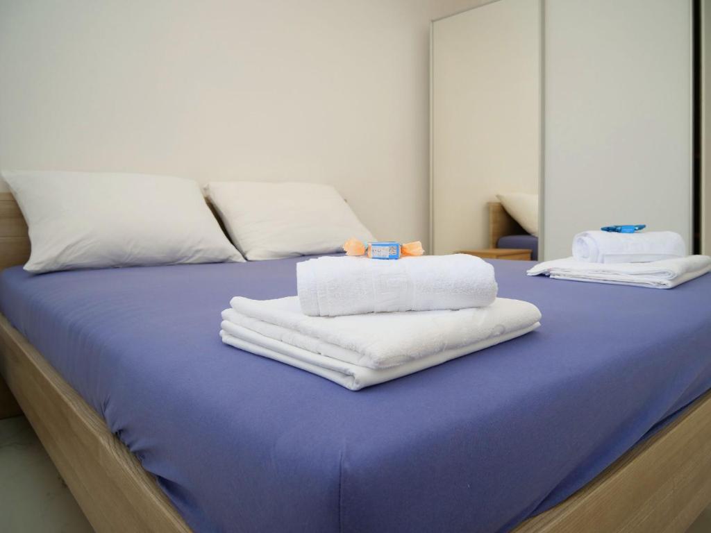 Posteľ alebo postele v izbe v ubytovaní Apartments Verdina