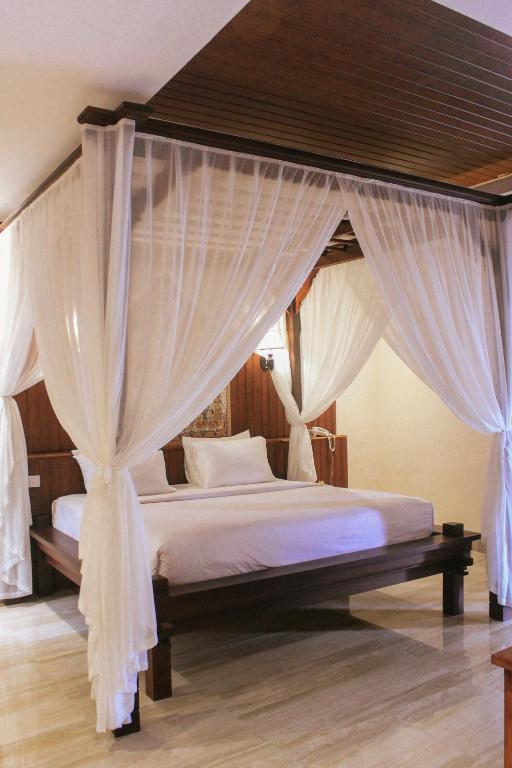 Postel nebo postele na pokoji v ubytování Champlung Sari Villa & Spa Ubud