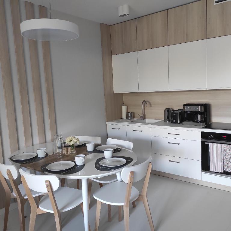 Kuchnia lub aneks kuchenny w obiekcie Sunrise Apartament