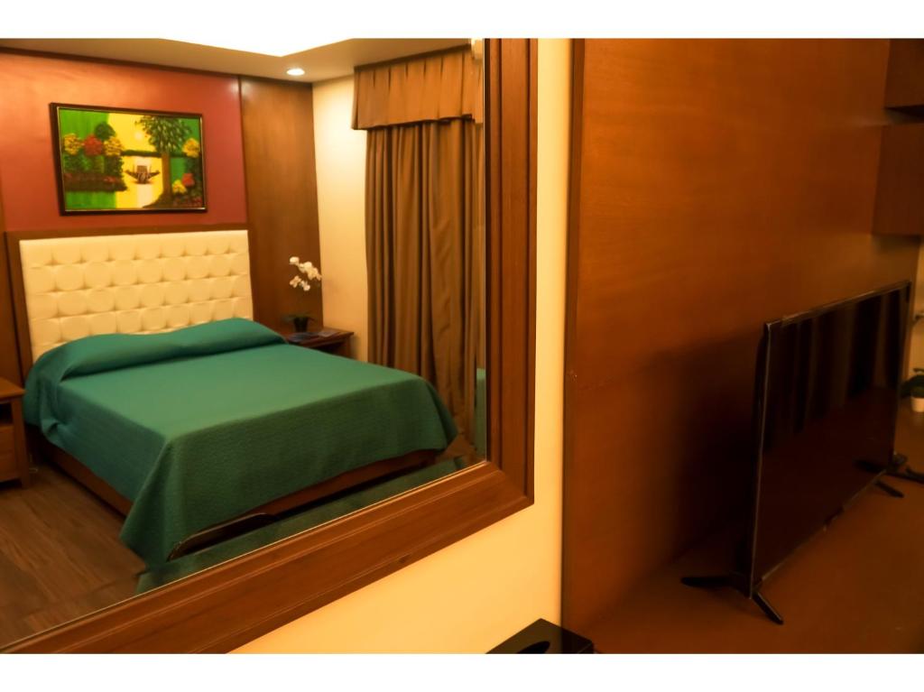 Postel nebo postele na pokoji v ubytování M28 Hotel and Apartments