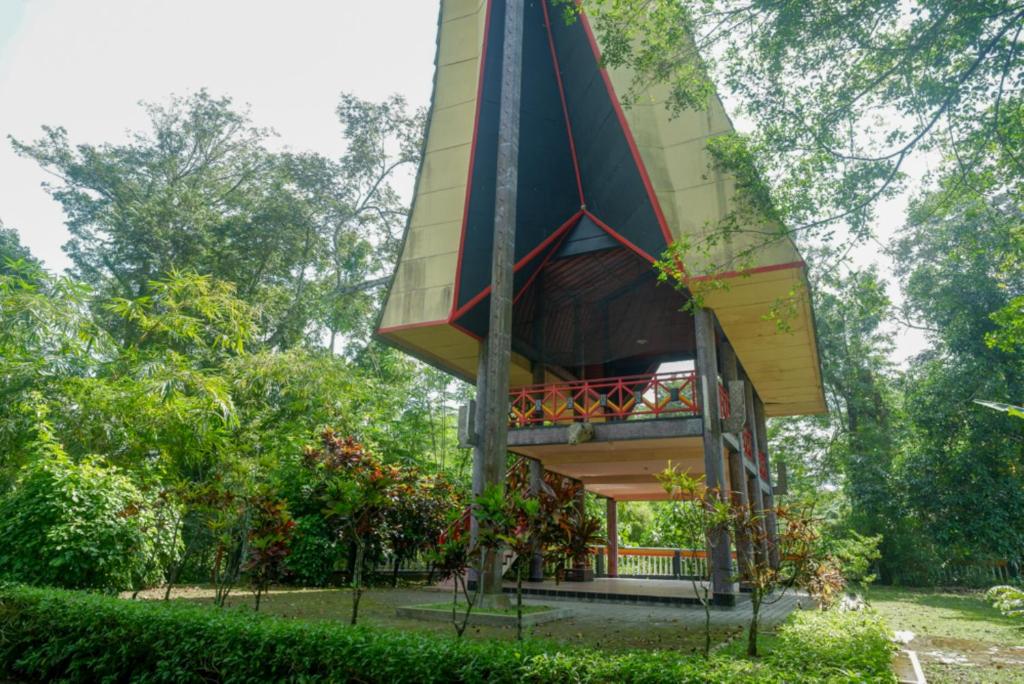 Zahrada ubytování Urbanview Resort Kampoeng Media Yogyakarta by RedDoorz