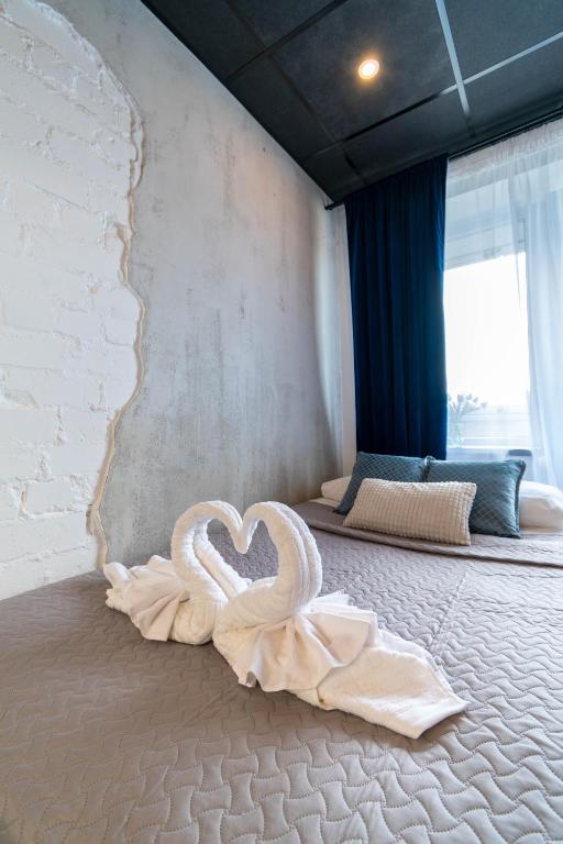 Postel nebo postele na pokoji v ubytování Apartments24 Ilu