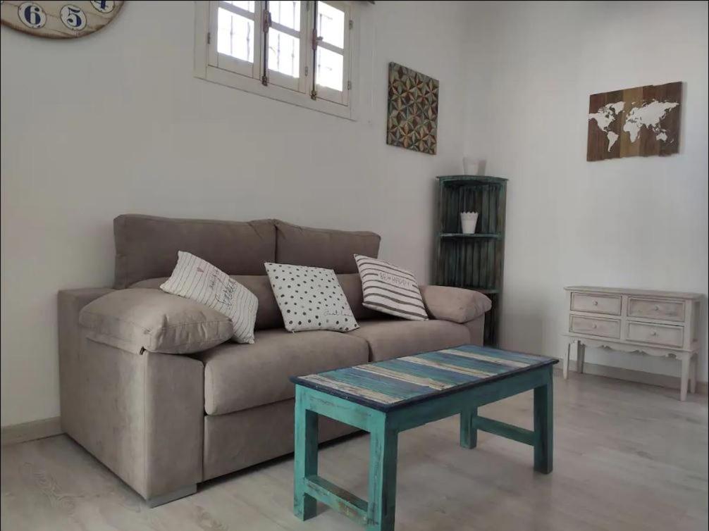 a living room with a couch and a coffee table at Ave Maria 8 in Tarifa