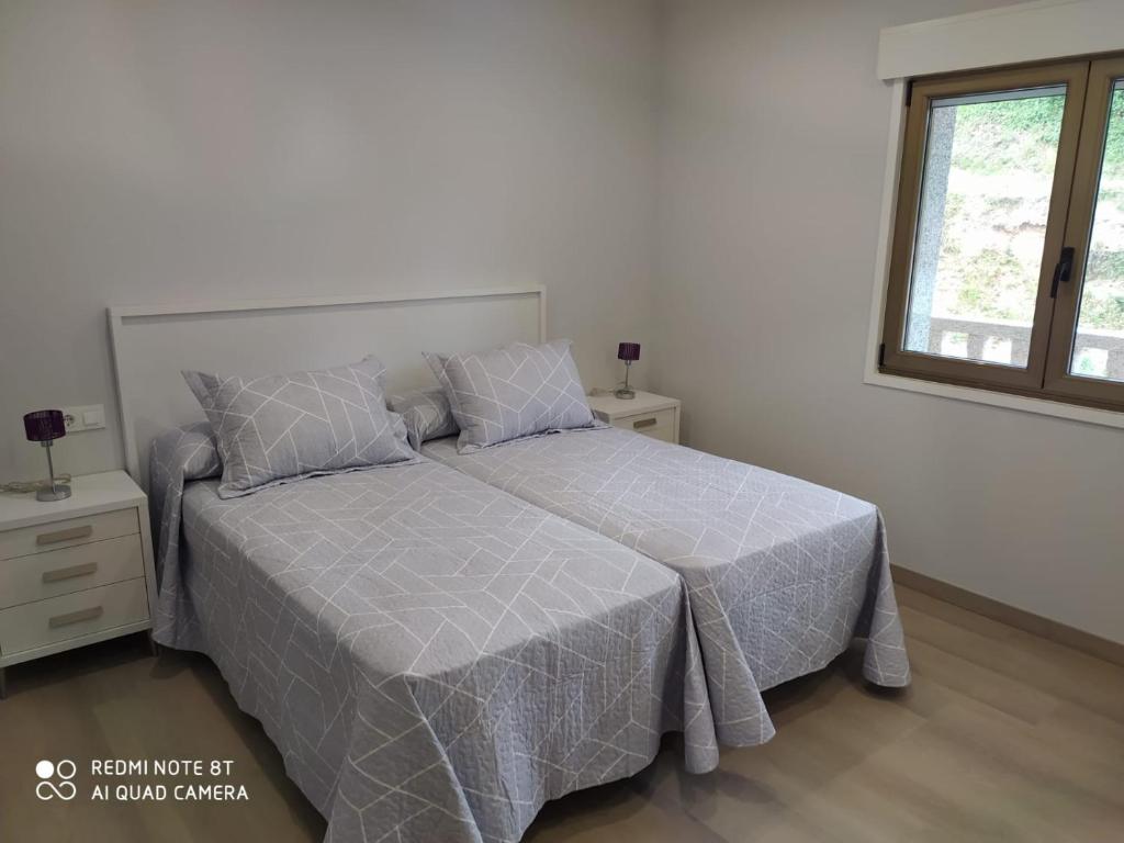 Posteľ alebo postele v izbe v ubytovaní Casa Surf Lanzada