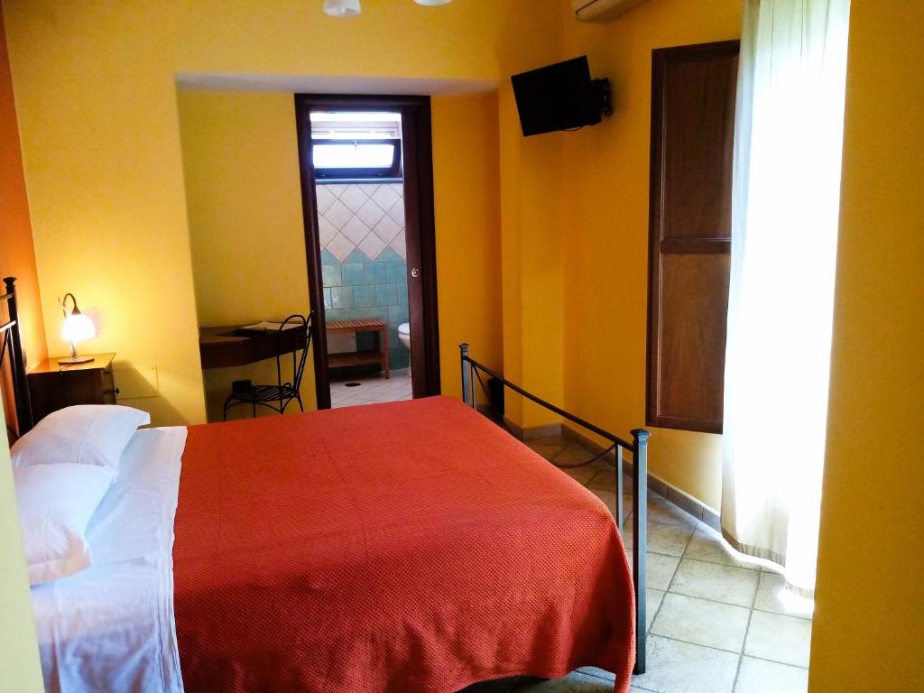 Postel nebo postele na pokoji v ubytování Hotel Pace