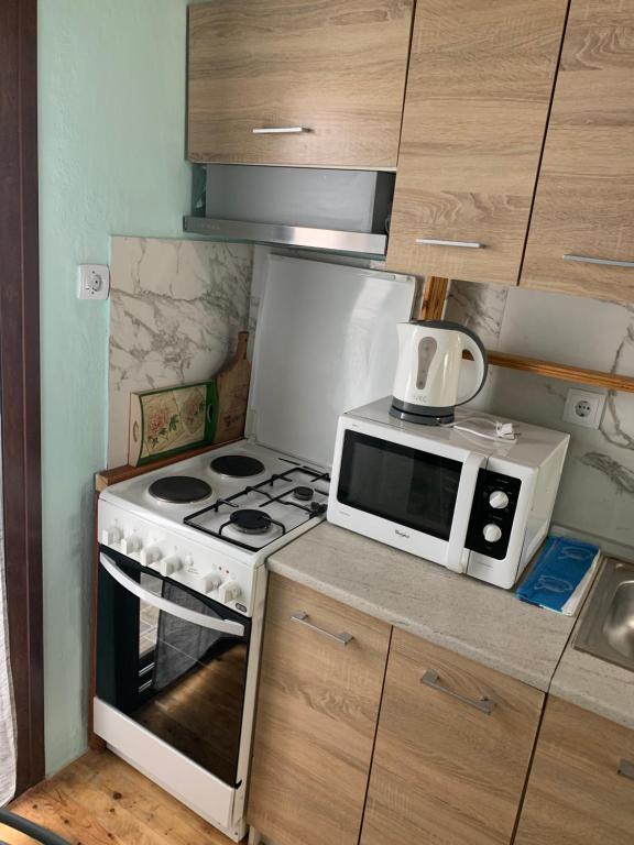 Kuchyňa alebo kuchynka v ubytovaní BACI HOUSE