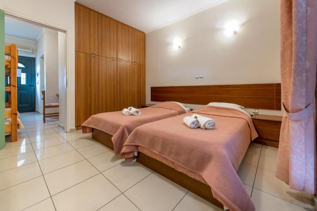 Postel nebo postele na pokoji v ubytování J Studios - Kineta Seaside Retreats