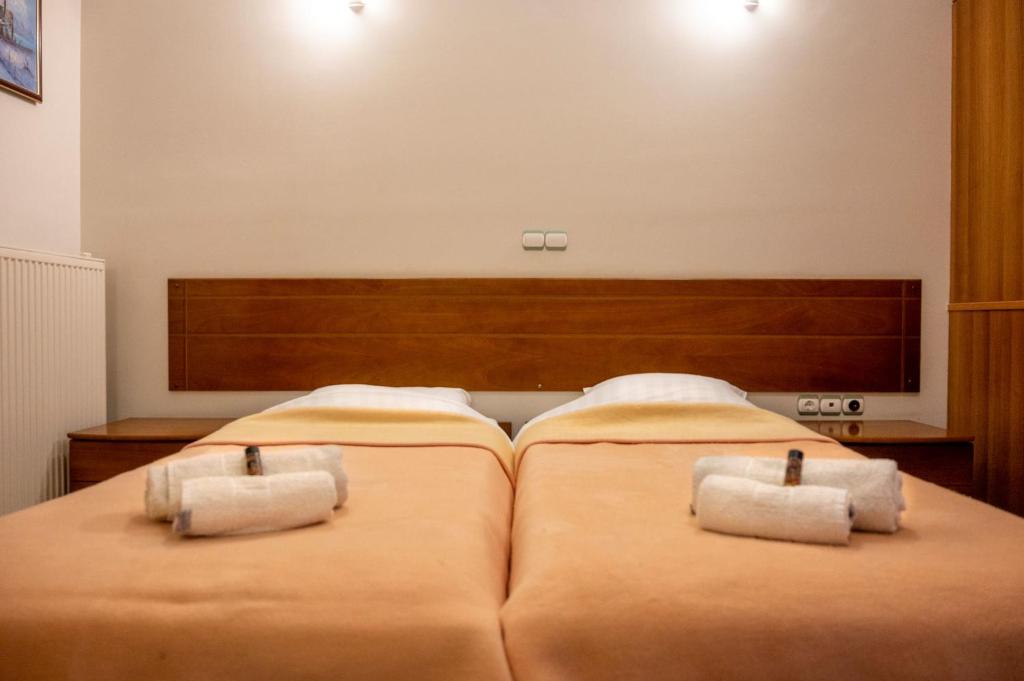 Postel nebo postele na pokoji v ubytování J Studios - Kineta Seaside Retreats