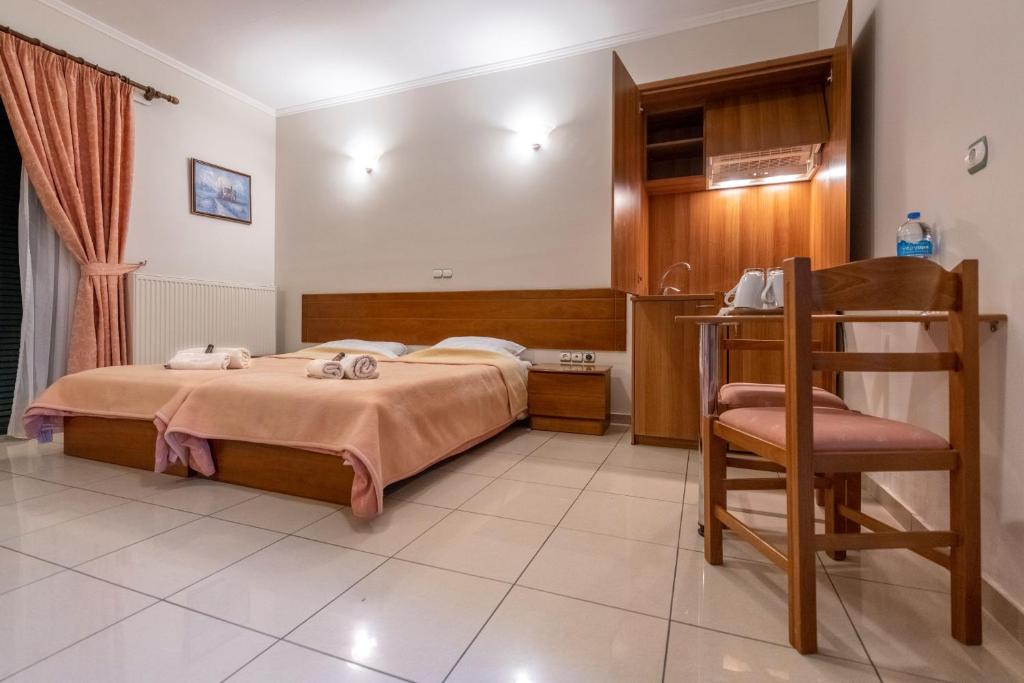 Postel nebo postele na pokoji v ubytování J Studios - Kineta Seaside Retreats