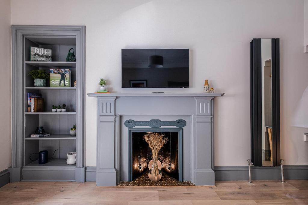 TV a/nebo společenská místnost v ubytování The Arran, St Andrews