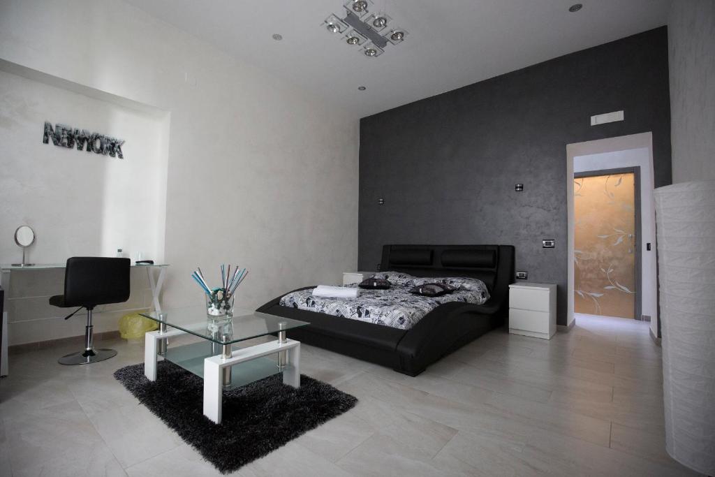 Posteľ alebo postele v izbe v ubytovaní MADB&B