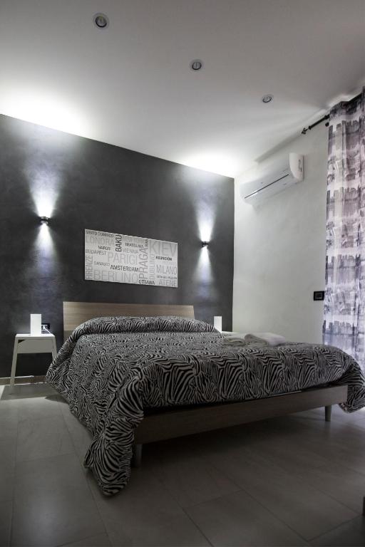 Posteľ alebo postele v izbe v ubytovaní MADB&B