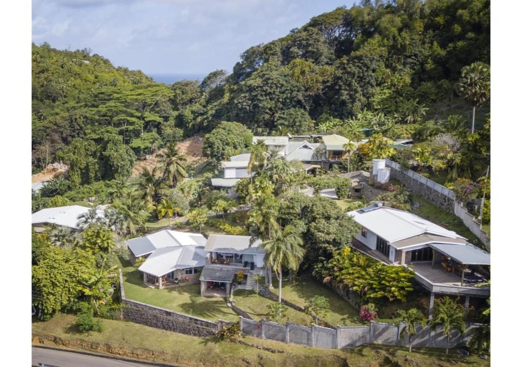 an aerial view of a house on a mountain at Anse Soleil Resort in Baie Lazare Mahé