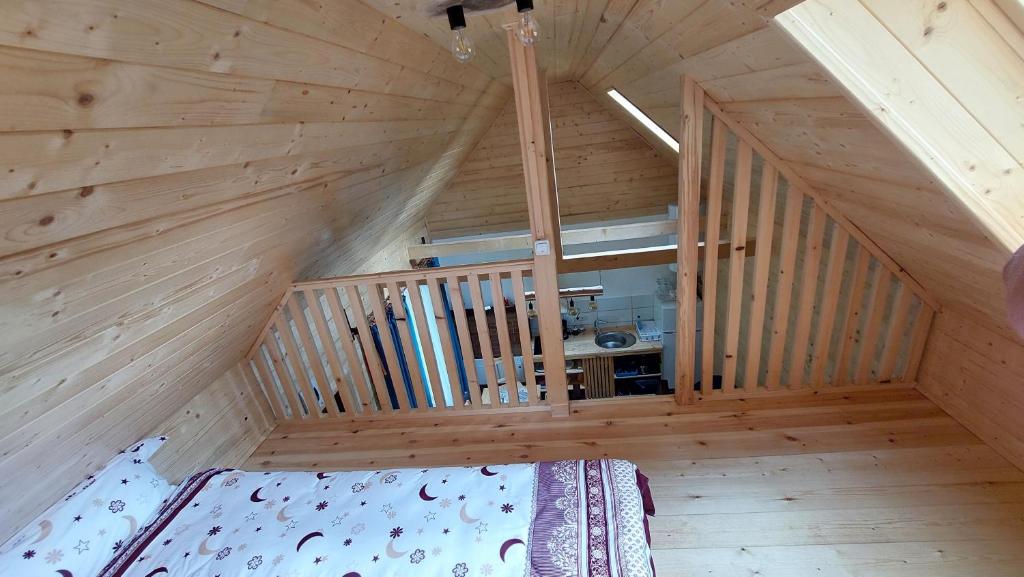Postel nebo postele na pokoji v ubytování Tiny house Casa Axa