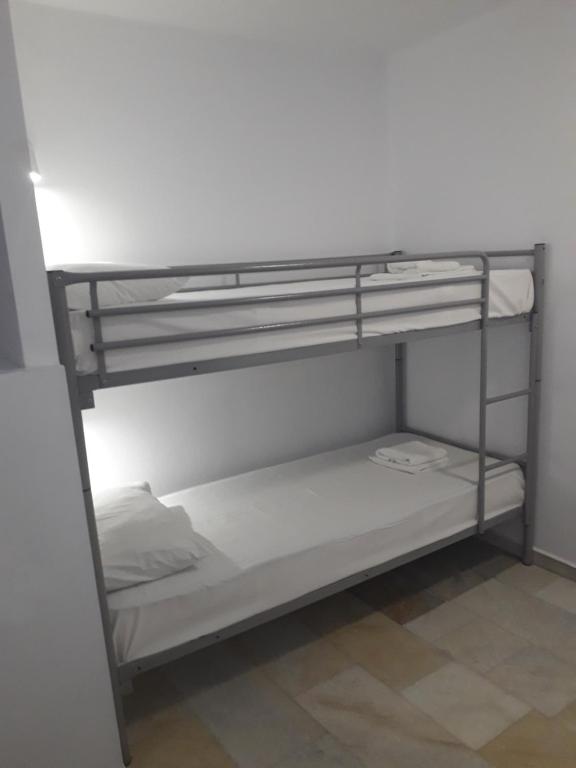 Postel nebo postele na pokoji v ubytování Naxos Hostel
