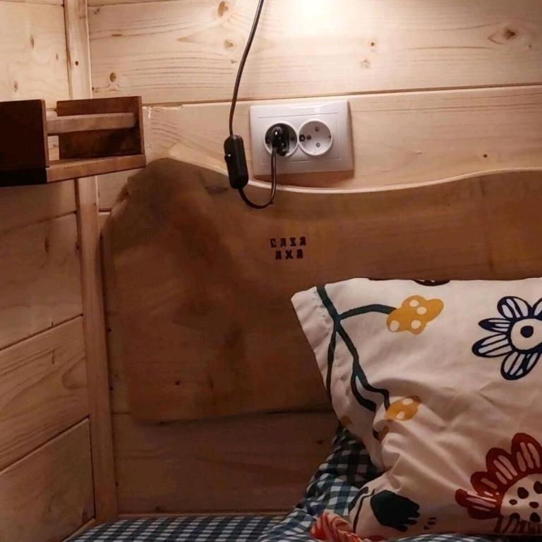 Postel nebo postele na pokoji v ubytování Tiny house Casa Axa