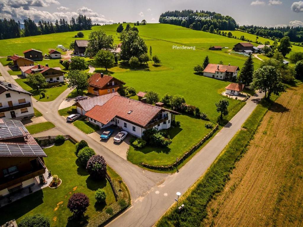 an aerial view of a village with a house at Ferienwohnungen Anna Geißinger in Mauth