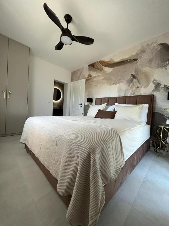 Posteľ alebo postele v izbe v ubytovaní CUBE Residence
