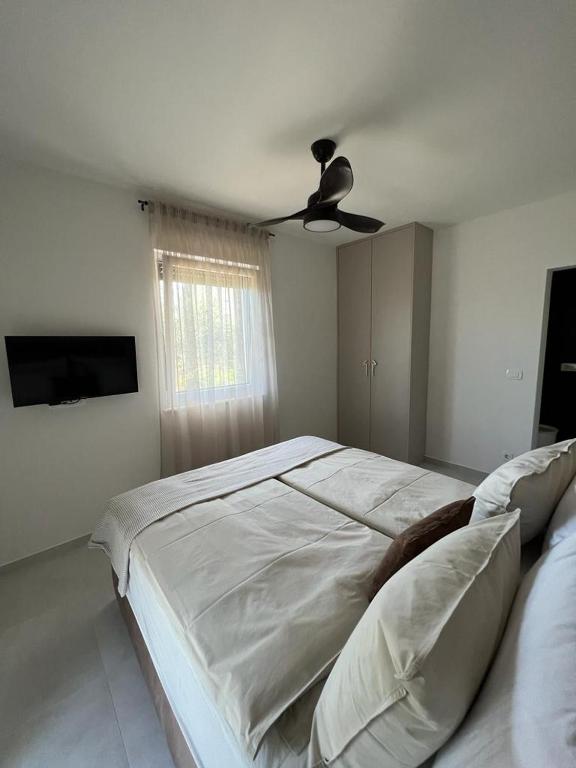Posteľ alebo postele v izbe v ubytovaní CUBE Residence