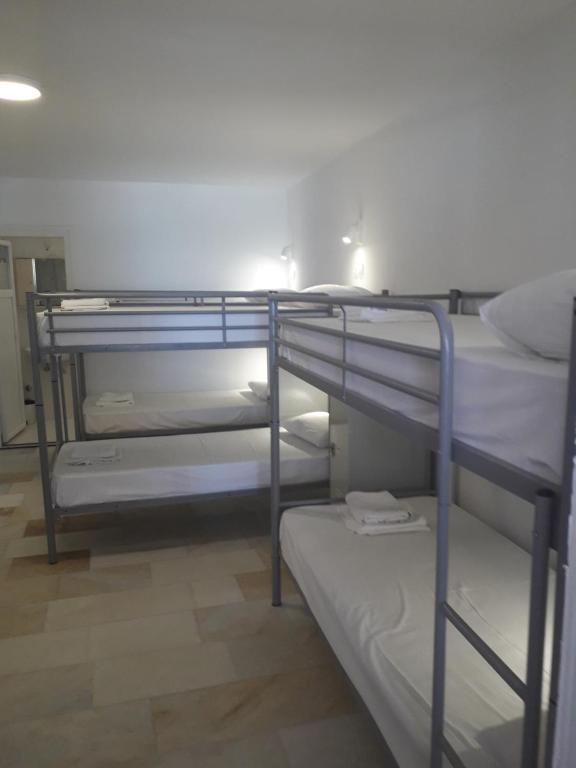 Postel nebo postele na pokoji v ubytování Naxos Hostel