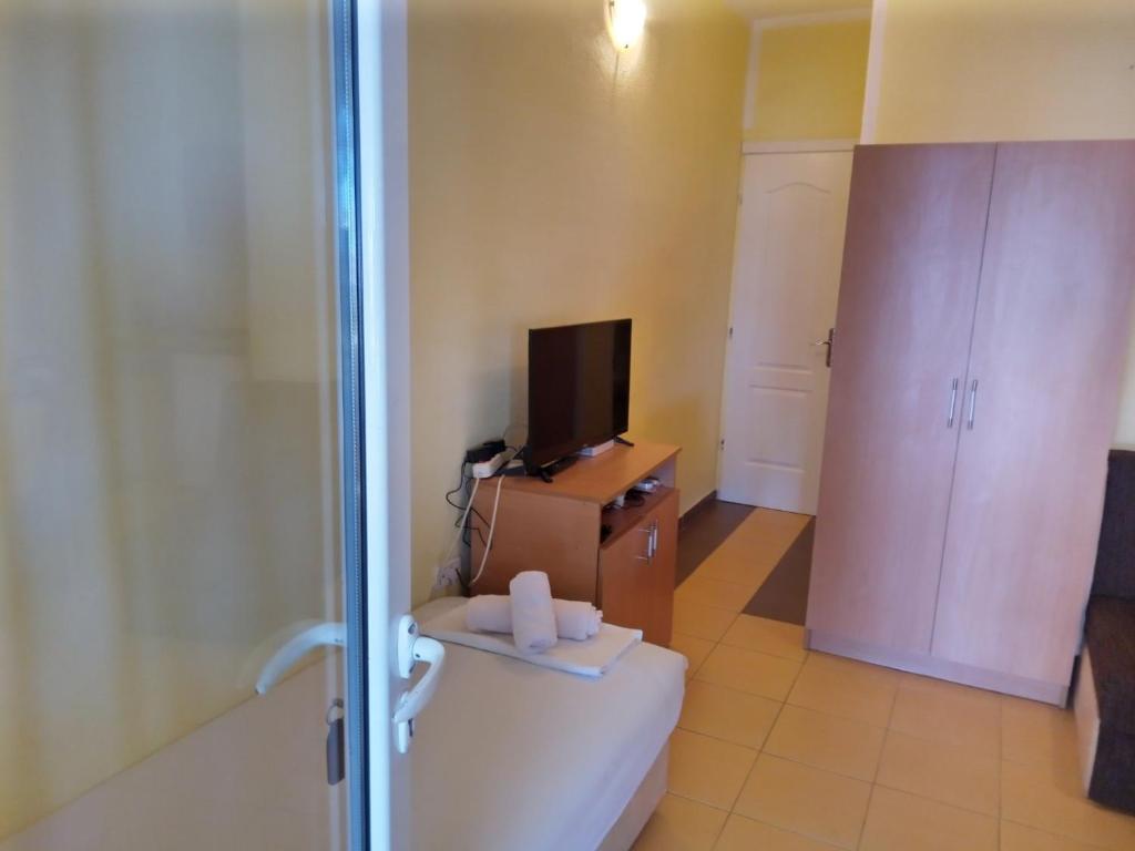 Postel nebo postele na pokoji v ubytování Vila Branka