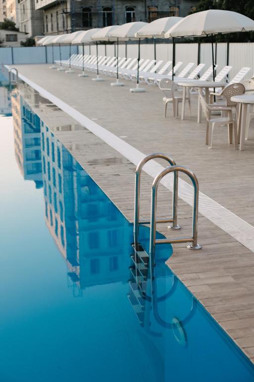Bazén v ubytování DEM Hotel nebo v jeho okolí