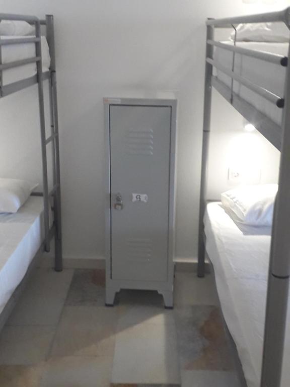 Postel nebo postele na pokoji v ubytování Naxos Hostel