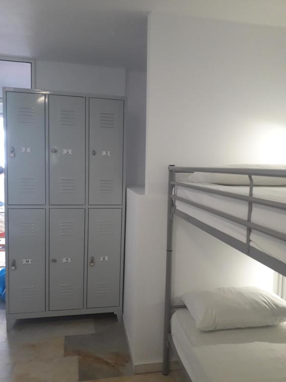 Postel nebo postele na pokoji v ubytování Naxos Hostel