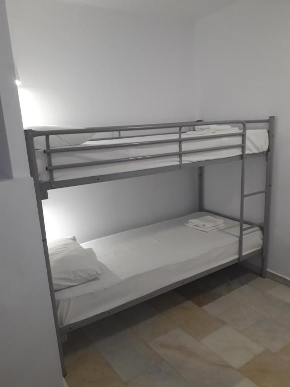 Postel nebo postele na pokoji v ubytování Naxos Hostel