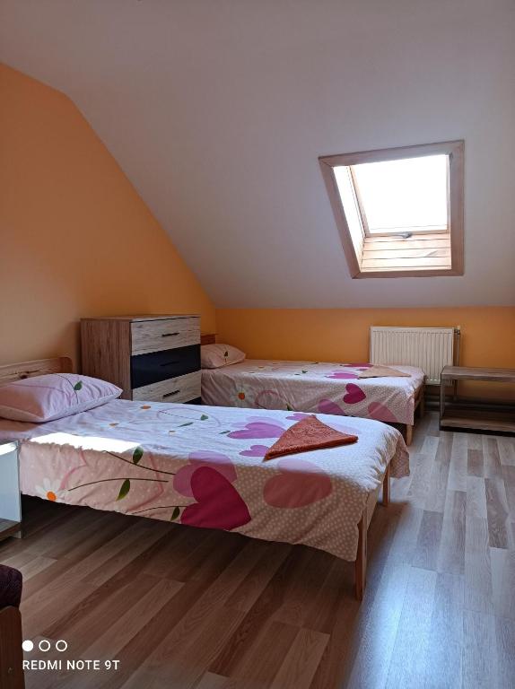 Postel nebo postele na pokoji v ubytování Lapegles 2