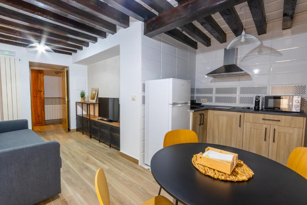 Kuchyň nebo kuchyňský kout v ubytování Apartamentos Turísticos La Casa Grande