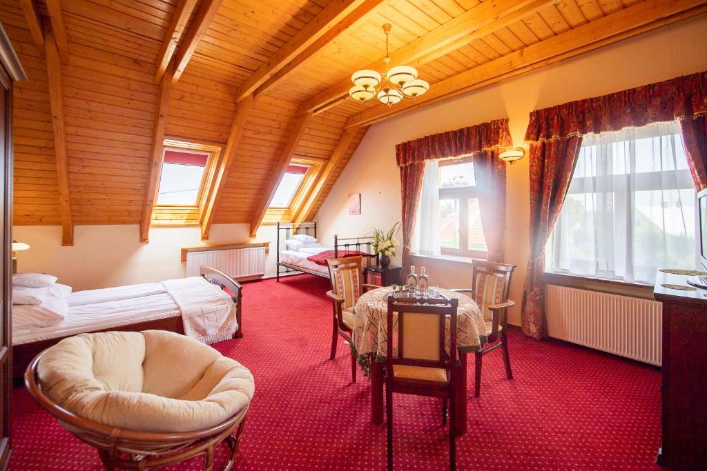 Posteľ alebo postele v izbe v ubytovaní Apartamenty Galeria Trunków