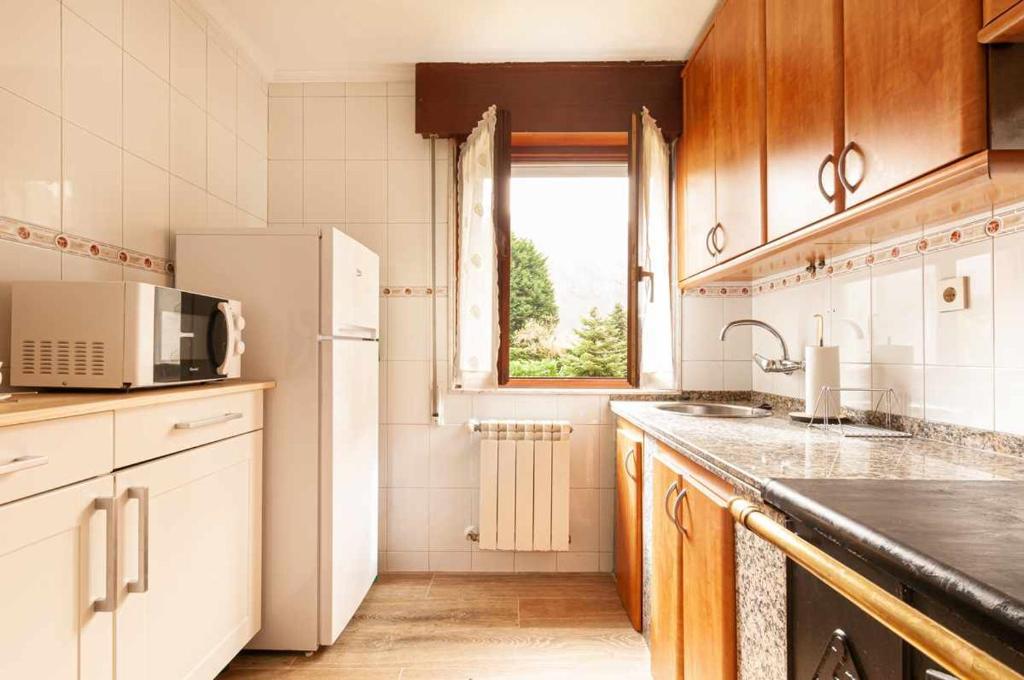 A kitchen or kitchenette at La casina de cuevas del agua