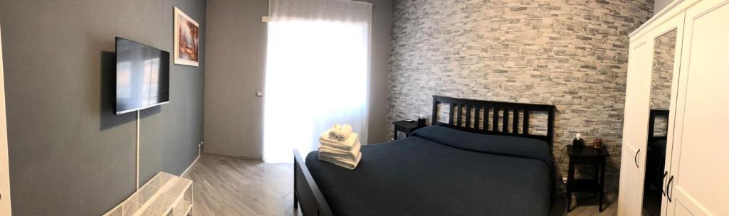 Letto o letti in una camera di LA LOGGIA