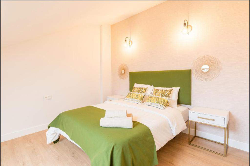 Postel nebo postele na pokoji v ubytování Duplex Merced10 3J