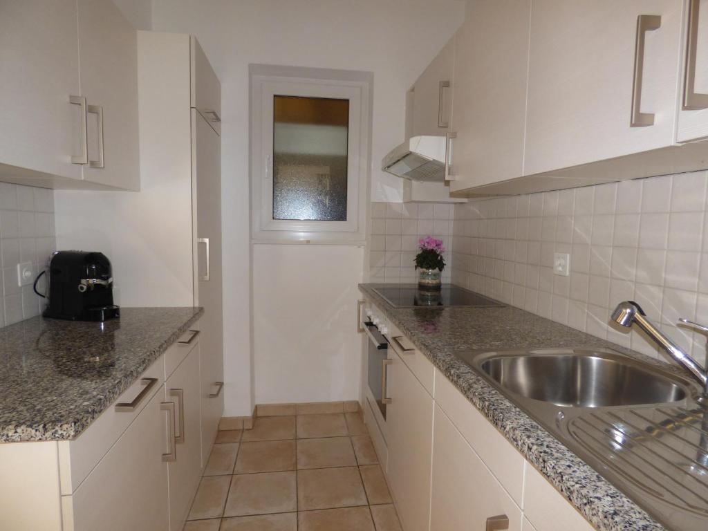 Kuchyň nebo kuchyňský kout v ubytování Casa Conti al Lago