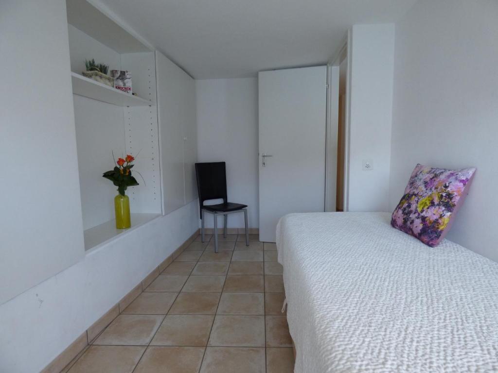Postel nebo postele na pokoji v ubytování Casa Conti al Lago