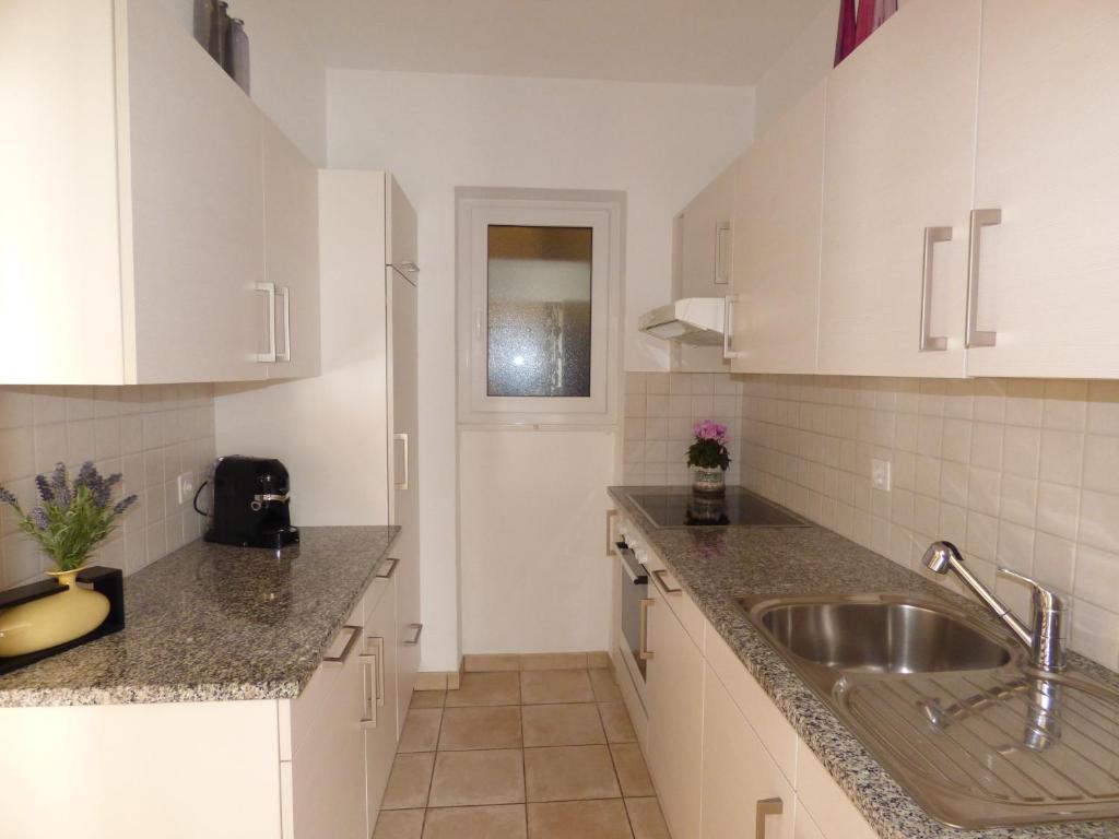 Kuchyň nebo kuchyňský kout v ubytování Casa Conti al Lago