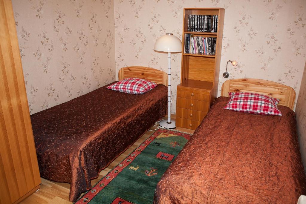 Postel nebo postele na pokoji v ubytování Voosemetsa Turismitalu