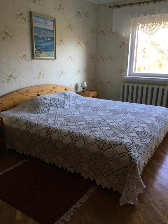 Postel nebo postele na pokoji v ubytování Voosemetsa Turismitalu