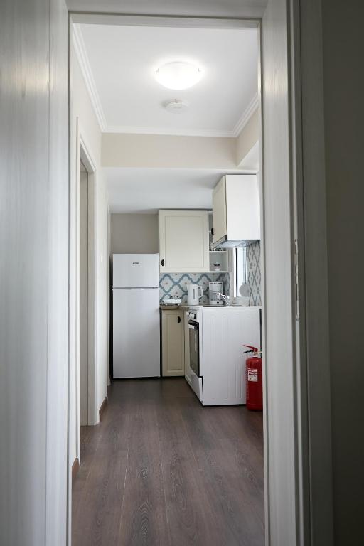 Kuchyň nebo kuchyňský kout v ubytování Romilia Guesthouse