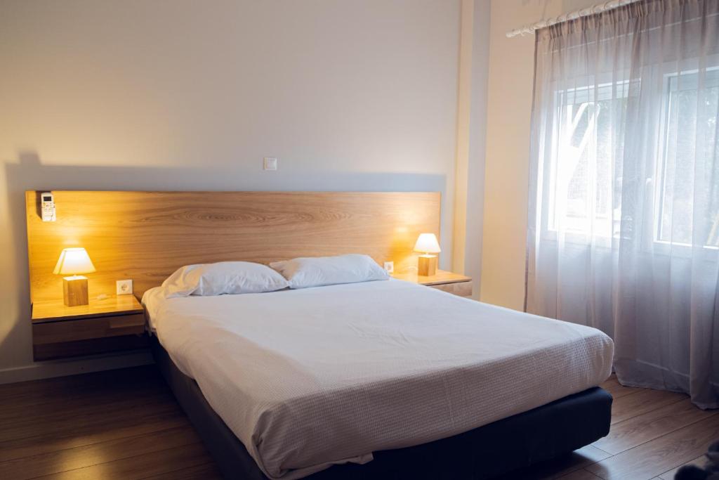 Posteľ alebo postele v izbe v ubytovaní Sappho Studios