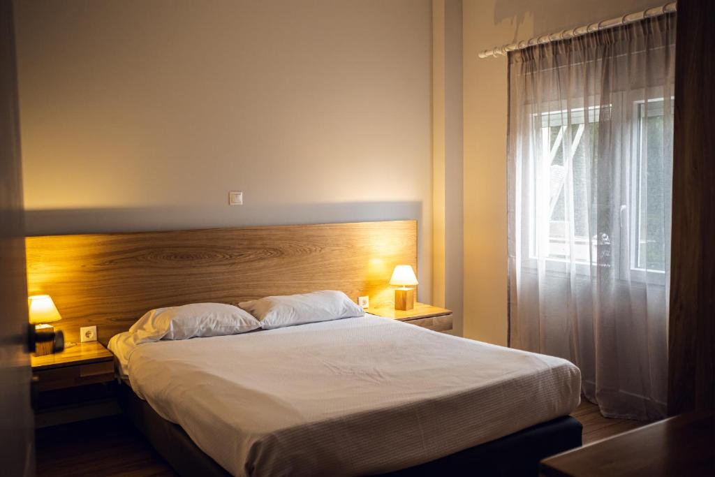 Posteľ alebo postele v izbe v ubytovaní Sappho Studios