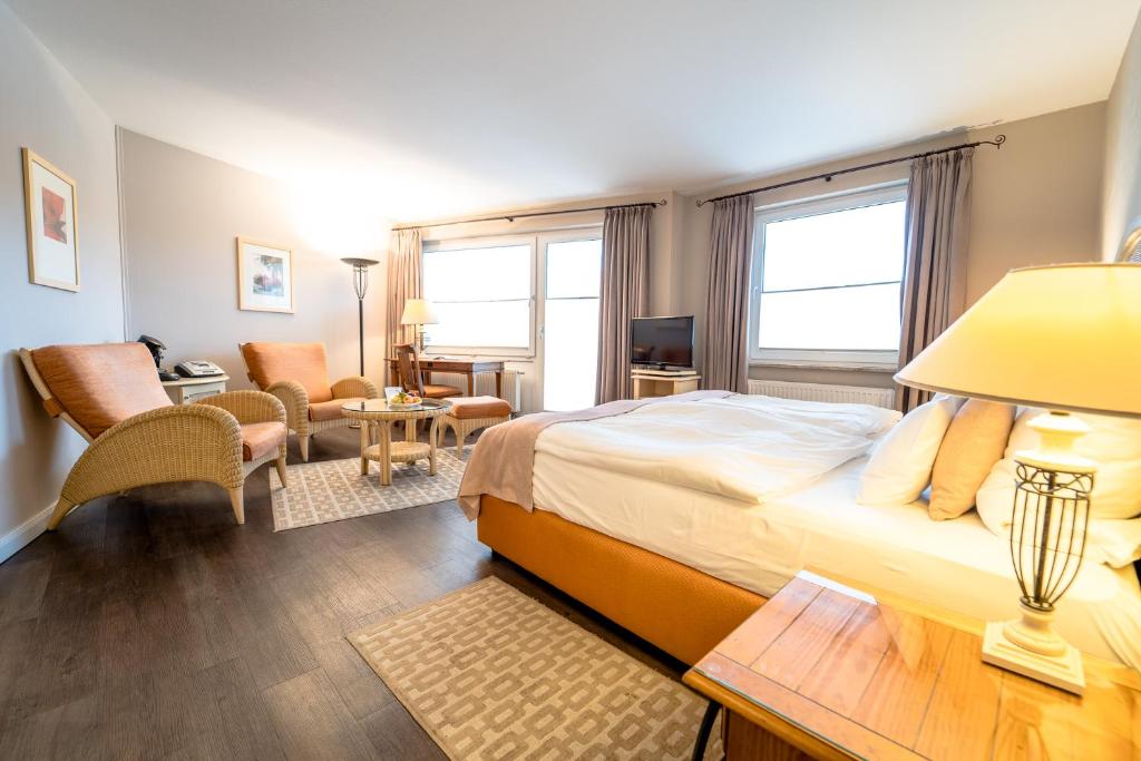 Postel nebo postele na pokoji v ubytování Romantischer Winkel RoLigio & Wellness Resort