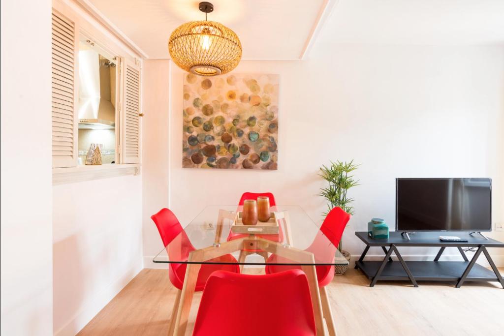 Televízia a/alebo spoločenská miestnosť v ubytovaní Merced10 Duplex 3I