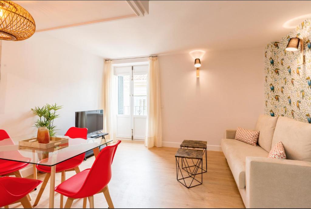 Televízia a/alebo spoločenská miestnosť v ubytovaní Merced10 Duplex 3I